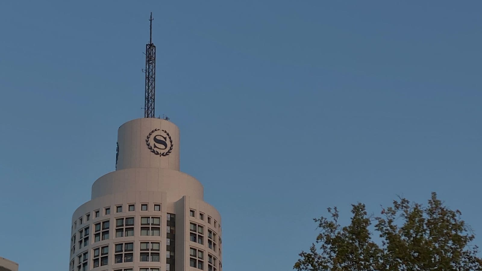 Hotel building representing how GSA per diem rates are set from lodging industry survey data